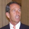 Sanford Blasts Whittle’s “Golden Parachute”