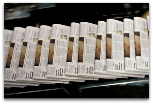 newspaper-con newspaper-con