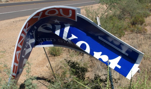 vandalized sign